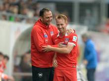 Frank Schmidt (l.) und Marc Schnatterer bleiben bis 2020 in Heidenheim