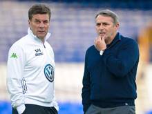 VfL-Coach Dieter Hecking (l) und Manager Klaus Allofs sorgen sich um viele Ausfälle