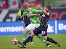 Wolfsburgs Kevin De Bruyne (l.) war wieder nicht zu halten und auch gegen Freiburg der Mann des Spiels