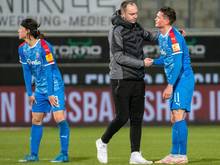 Die Kieler um Trainer Ole Werner (M.) stehen vor einem knüppeldicken Restprogramm