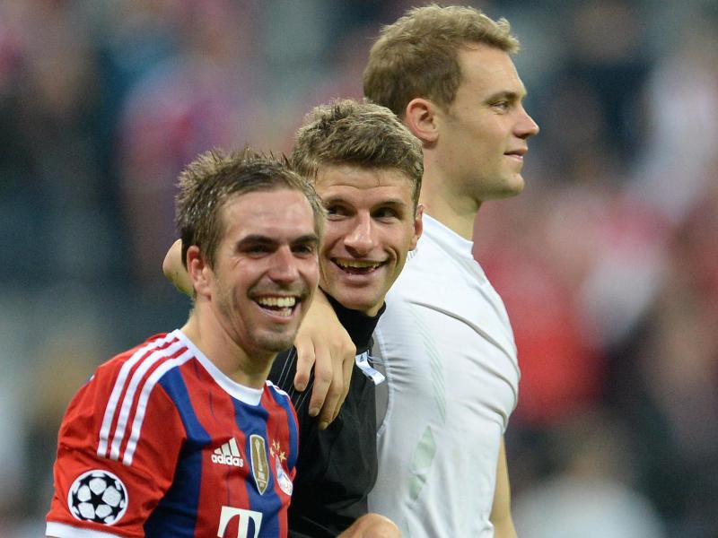 Die Bayern-Spieler Philipp Lahm, Thomas Müller und Manuel Neuer gehen zuversichtlich in das Spiel gegen den HSV