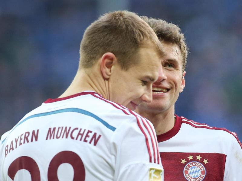Holger Badstuber (l.) und Thomas Müller sind über den Druck durch den VfL Wolfsburg erfreut