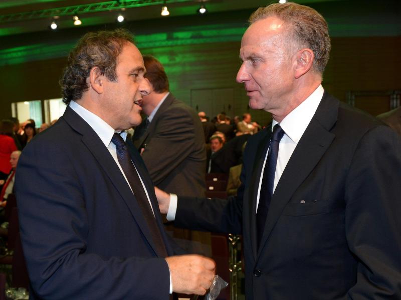 ECA-Chef Karl-Heinz Rummenigge (r.) fand eine Einigung mit UEFA-Präsident Michel Platini
