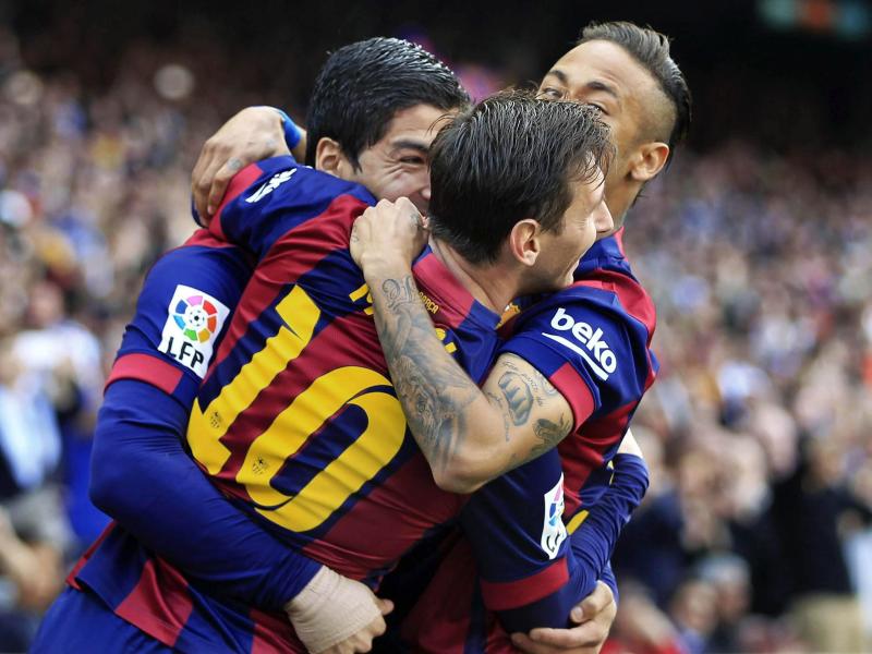Luis Suarez (l.) und Lionel Messi (M.) führten den FC Barcelona zum Sieg
