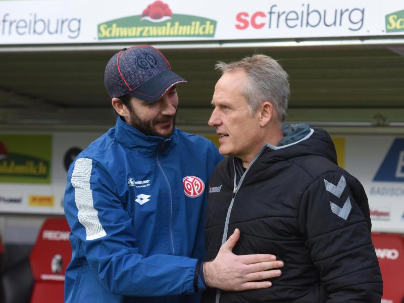 Am Montagabend treffen die Teams von Mainz-Coach Sandro Schwarz (l.) und SC-Trainer Christian Streich aufeinander