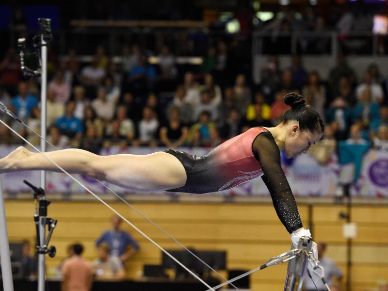 Die deutsche Turnerin Kim Bui hat die erste WM-Qualifikation mit 53,000 Punkten für sich entschieden Die deutsche Turnerin Kim Bui hat die erste WM-Qualifikation mit 53,000 Punkten für sich entschieden