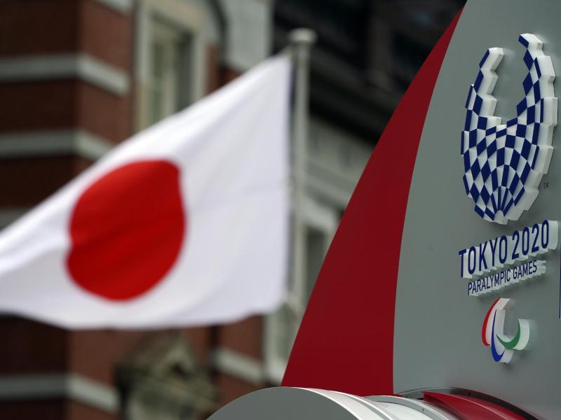 Ein Mitarbeiter des japanischen OK der Olympischen Spiele wurde positiv auf das Cornavirus getestet. Foto: Eugene Hoshiko/AP/dpa Ein Mitarbeiter des japanischen OK der Olympischen Spiele wurde positiv auf das Cornavirus getestet. Foto: Eugene Hoshiko/AP/dpa