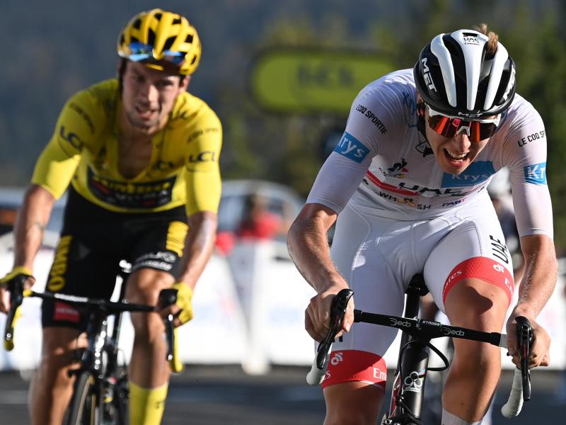 Tadej Pogacar (r.) und sein slowenischer Landsmann Primoz Roglic wollen bei der Straßenrad-WM um den Sieg mitfahren Tadej Pogacar (r.) und sein slowenischer Landsmann Primoz Roglic wollen bei der Straßenrad-WM um den Sieg mitfahren