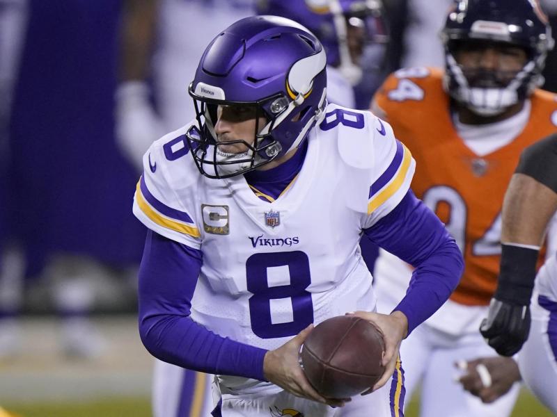 Kirk Cousins, Quarterback bei den Minnesota Vikings, in Aktion Kirk Cousins, Quarterback bei den Minnesota Vikings, in Aktion