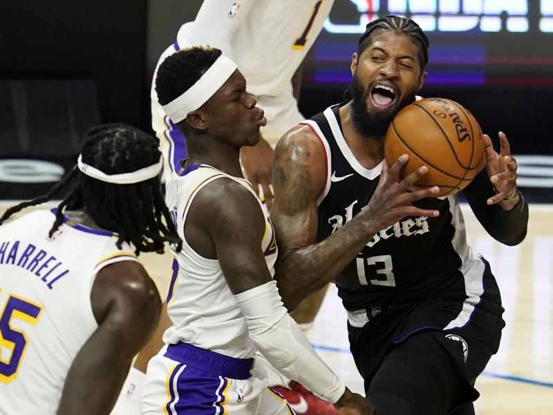 Paul George (r) von den Los Angeles Clippers gegen Dennis Schröder (M) von den Los Angeles Lakers Paul George (r) von den Los Angeles Clippers gegen Dennis Schröder (M) von den Los Angeles Lakers