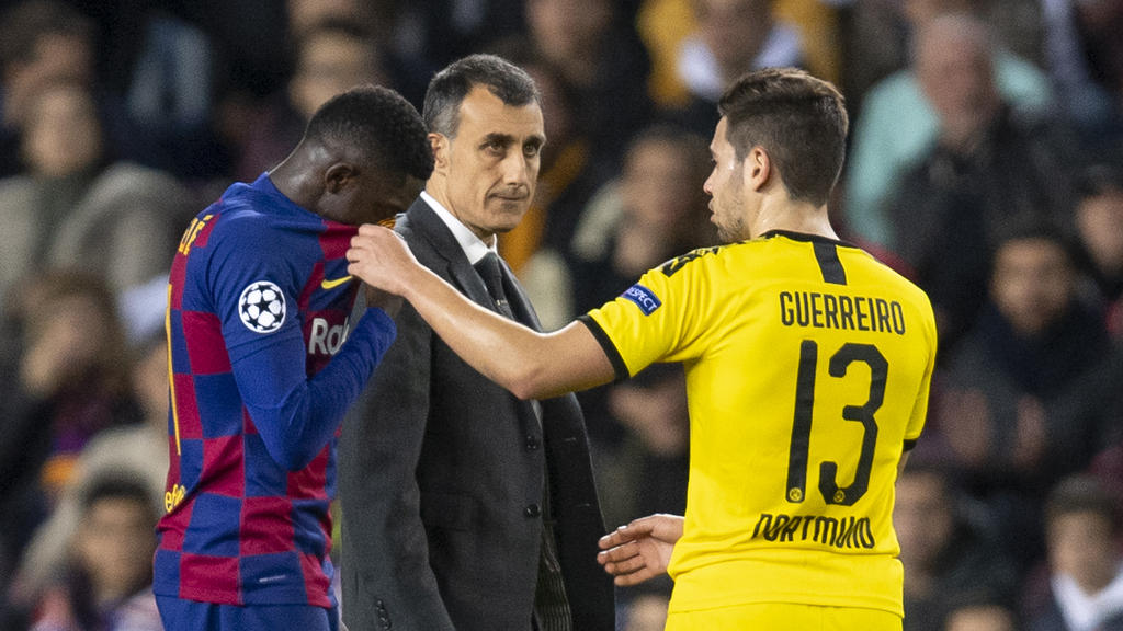 BVB-Profi Guerreiro (r.) entschuldigte sich bei Barcelonas Dembélé nach dessen Foul