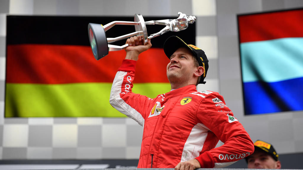 Der König von Spa mit seiner Königin: Sebastian Vettel mit Loria Der König von Spa mit seiner Königin: Sebastian Vettel mit Loria