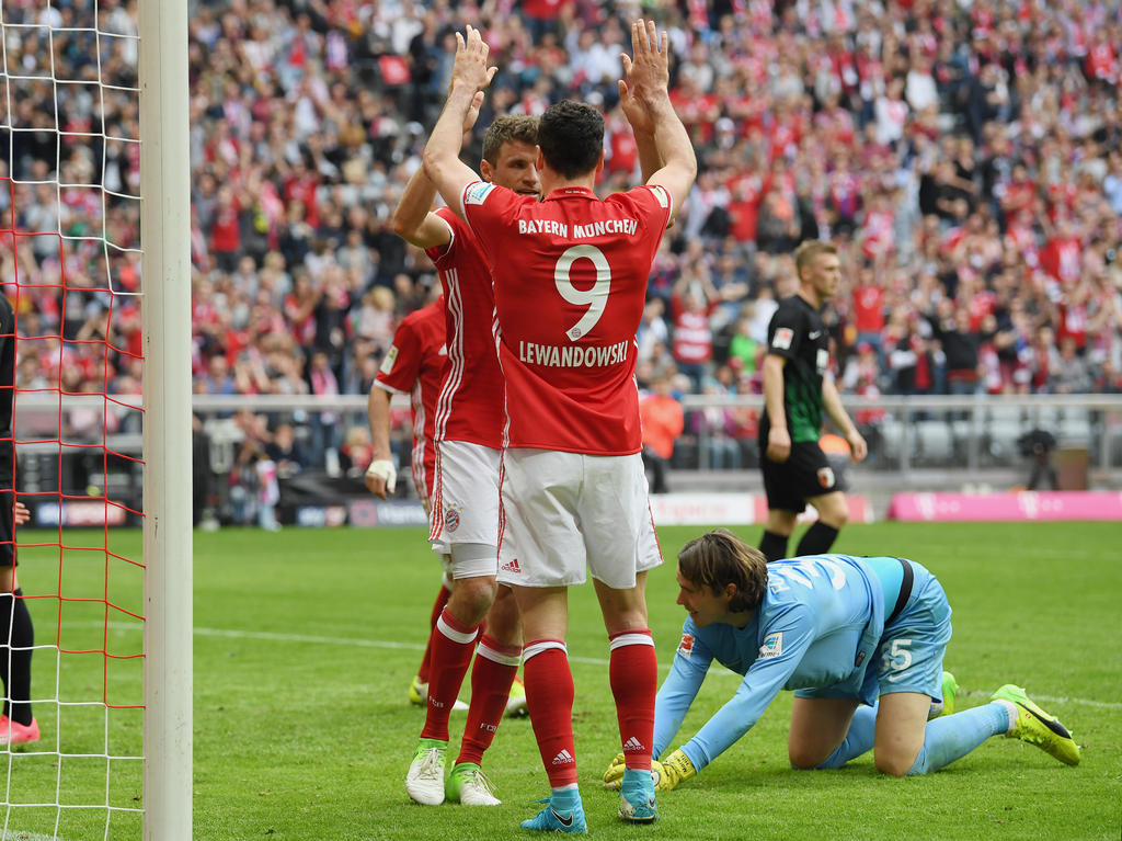 Müller (l.) traf gegen Augsburg doppelt, Lewandowski sogar dreifach