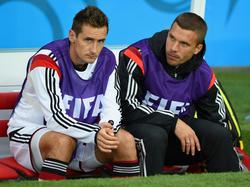 Miroslav Klose (l.) und Lukas Podolski sitzen bei ihren Klubs derzeit auf der Bank