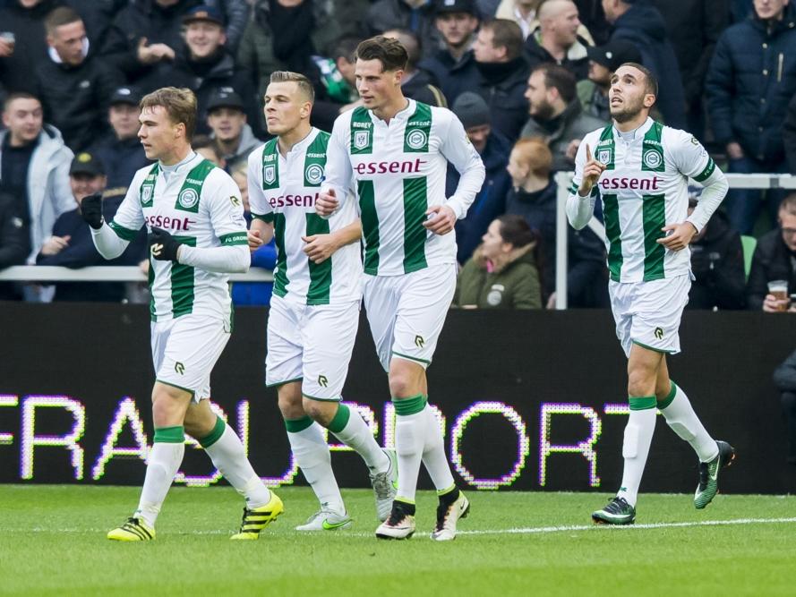 De spelers van FC Groningen lopen tevreden weg na het doelpunt van Mimoun Mahi (r.) tegen Go Ahead Eagles. (18-12-2016)