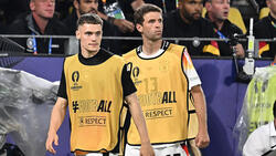 Florian Wirtz (l.) und Thomas Müller spielten in der Nationalmannschaft im letzten Jahr noch zusammen