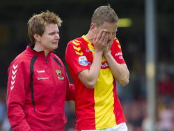 Sjoerd Overgoor (r.) moet een traantje wegpinken na afloop van het play-offduel Go Ahead Eagles - De Graafschap. (25-05-2015)