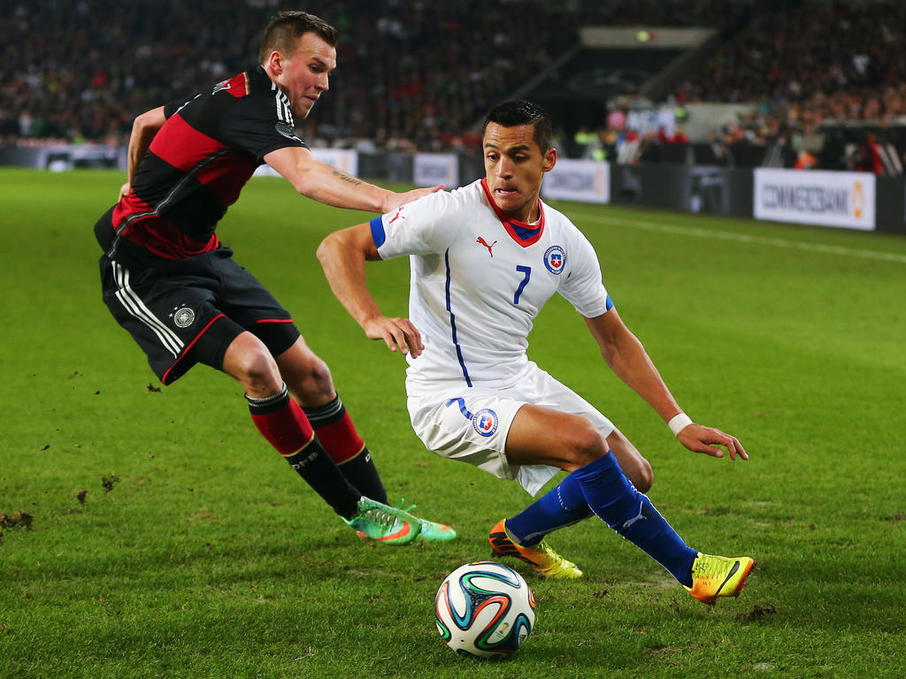 Kevin Großkreutz (l., gegen Chiles Alexis Sánchez) wird vorerst nicht mehr zur Nationalmannschaft gehören