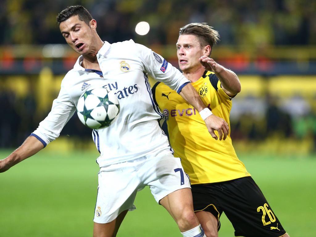 Streiten sich am Mittwochabend um den Gruppensieg: Reals Ronaldo (l.) und Dortmunds Piszczek