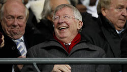Sir Alex Ferguson laughs in the stands during the Carabao Cup match at the Etihad Stadium, Manchester.