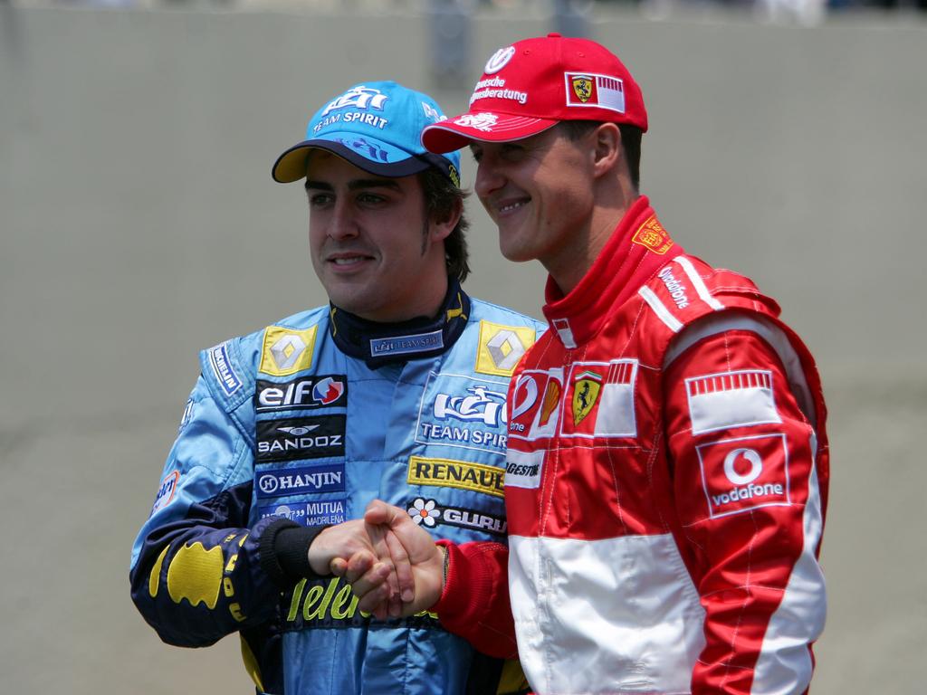 Fernando Alonso (li.) und Michael Schumacher Fernando Alonso (li.) und Michael Schumacher