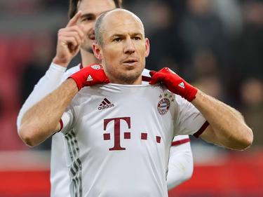 Grote opluchting bij Arjen Robben: dankzij twee late doelpunten wint Bayern op bezoek bij Ingolstadt. (11-02-2017)