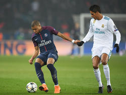 Kylian Mbappé (l.) verlor die beiden Duelle mit PSG gegen Real Madrid