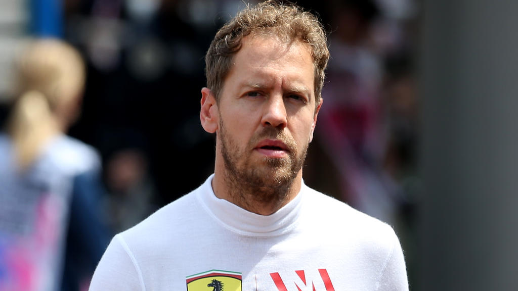 Sebastian Vettel freut sich über einen glücklichen zweiten Platz Sebastian Vettel freut sich über einen glücklichen zweiten Platz