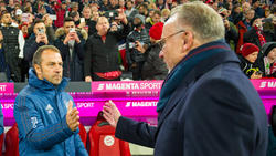 Hansi Flick (l.) hat einen Vertrag bis zum Sommer 2020 beim FC Bayern