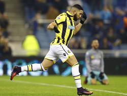 Adnane Tighadouini loopt juichend weg na zijn gelijkmaker voor Vitesse tegen Excelsior. (26-11-2016)