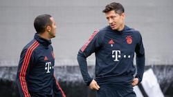 Lange Teamkollegen beim FC Bayern, nun Gegner bei der EM: Spaniens Thiago (l) und Polens Robert Lewandowski