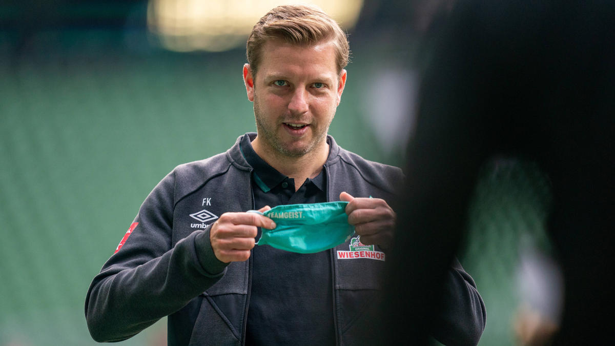 Nachdenklich mit Mundschutz: Werder-Coach Florian Kohfeldt vor dem Spiel gegen Bayer Leverkusen Nachdenklich mit Mundschutz: Werder-Coach Florian Kohfeldt vor dem Spiel gegen Bayer Leverkusen