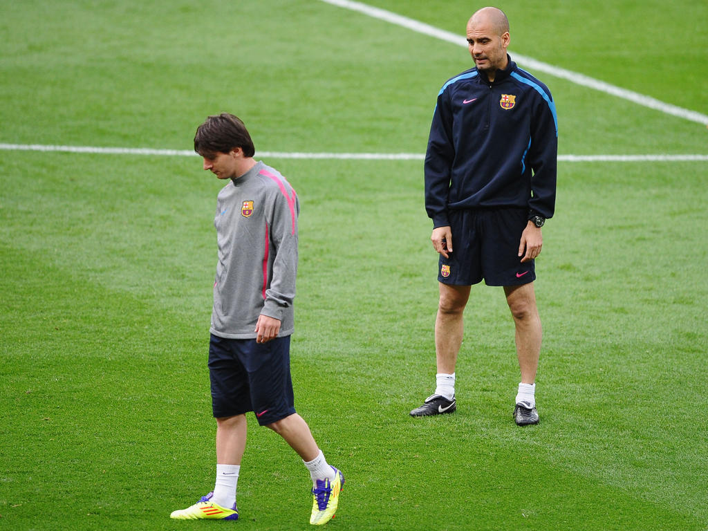 Imagen de archivo de un entrenamiento del Barça con Messi (izq.) y Pep. (Foto: Getty)