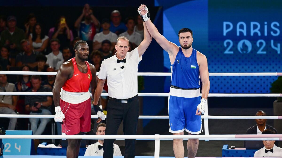 Boxer Nelvie Tiafack (l.) verpasst das Olympia-Finale, kann sich aber mit Bronze trösten