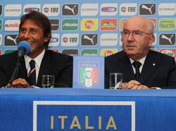 Conte junto a Carlo Tavecchio (dcha.)
