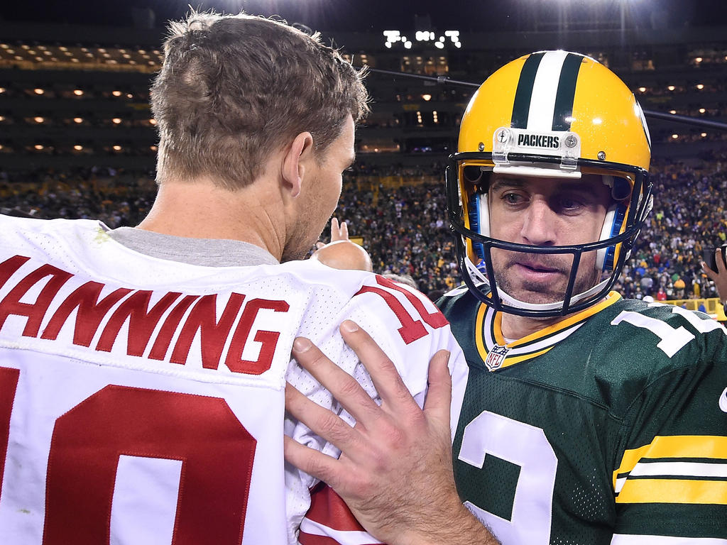 Eli Manning (l.) und Aaron Rodgers duellieren sich erneut Eli Manning (l.) und Aaron Rodgers duellieren sich erneut