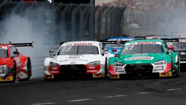 René Rast und Nico Müller kamen sich schon in der ersten Kurve sehr nahe René Rast und Nico Müller kamen sich schon in der ersten Kurve sehr nahe