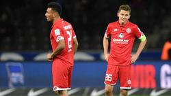 Die Mainzer Karim Onisiwo (l.) und Niko Bungert haben sich am 3. Spieltag verletzt