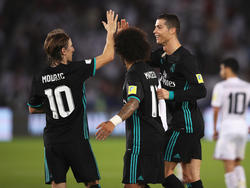 Modric, Marcelo y CR celebran el tanto del luso ante el Al Jazira. (Foto: Getty)