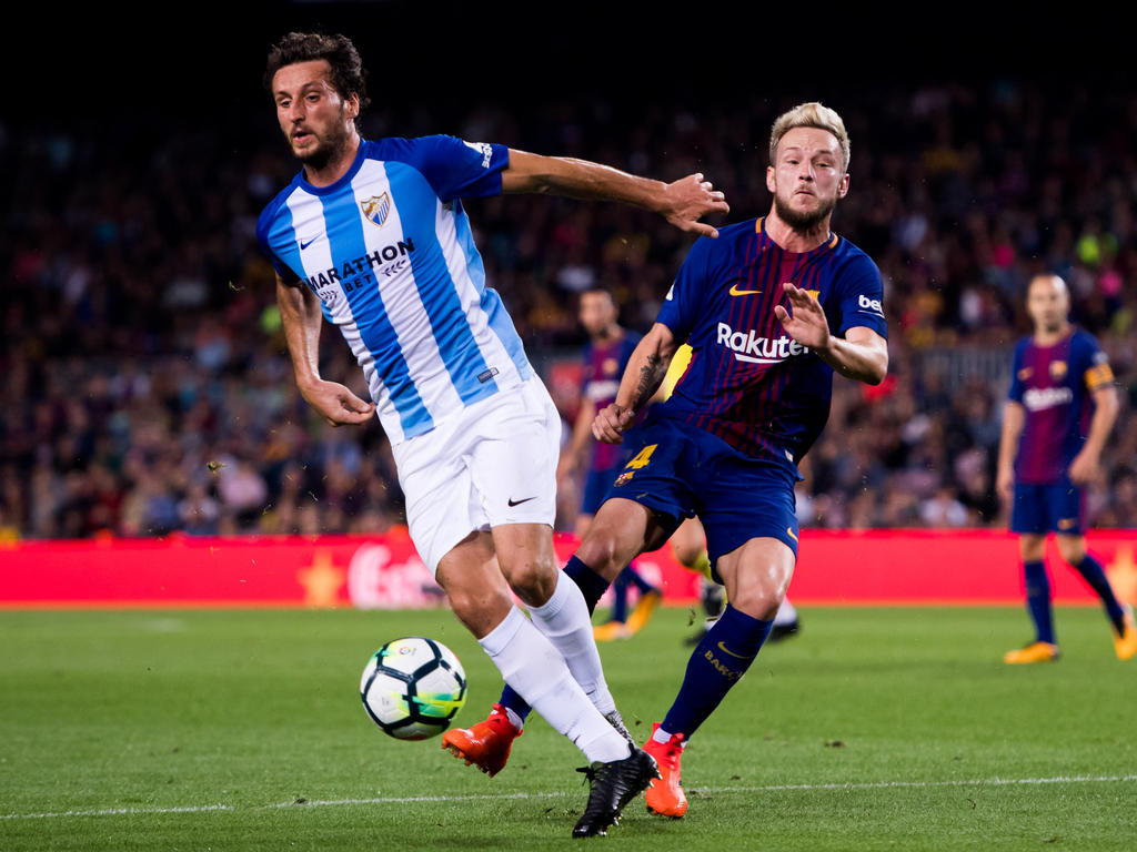 Ivan Rakitić (r.) und der FC Barcelona wollen in Málaga nichts anbrennen lassen. © Alex Caparrós/Getty Images