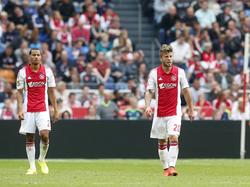 Ricardo van Rhijn (l.) en Lasse Schöne (r.) balen na een tegentreffer tijdens Ajax - PSV Eindhoven. (24-8-2014)