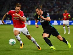 Gareth Bale (r.) im Finale des europäischen Supercups gegen Manchester United