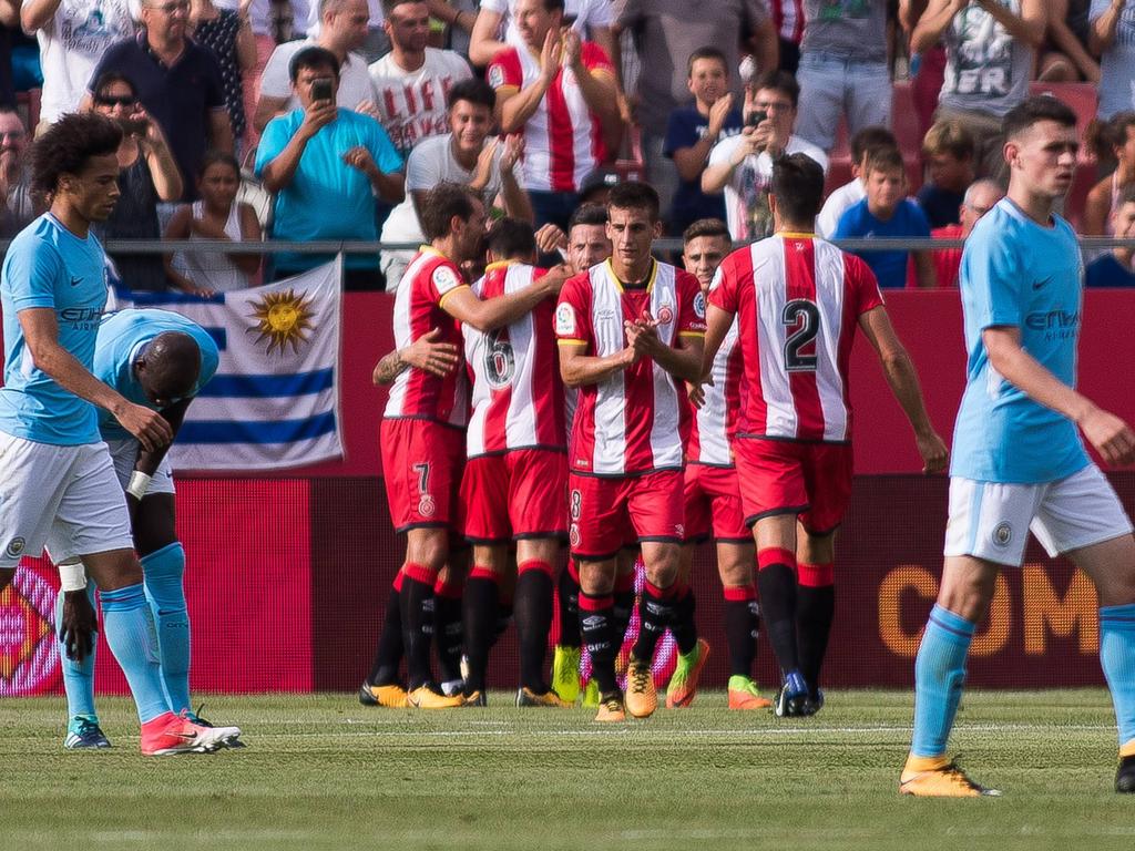 Die Spieler des FC Girona bejubeln einen Treffer im Freundschaftsspiel gegen Manchester City