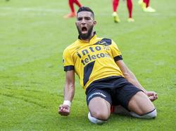 Adnane Tighadouini viert een treffer tijdens NAC Breda - FC Twente. (24-8-2014)