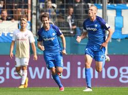 Robbie Kruse (l.) und Felix Bastians bejubeln den Bochumer Sieg gegen Ingolstadt