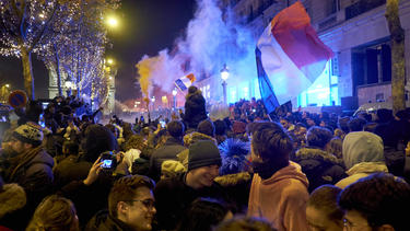 French supporters erupted in jubilation around the iconic Champs-Elysees avenue after France's triumph over Morocco on Wednesday