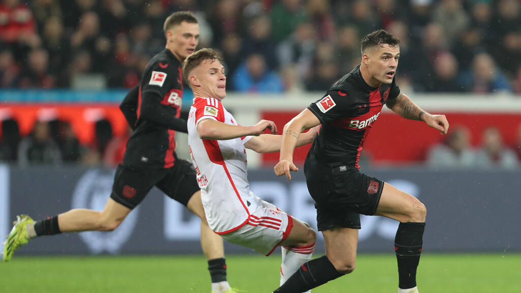 Joshua Kimmich vom FC Bayern und Granit Xhaka von Bayer Leverkusen werden sich am Samstag gegenüberstehen