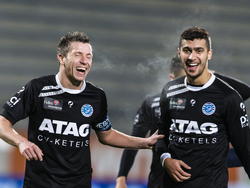 Edwin Linssen (l.) en Soufian Echcharaf (r.) van De Graafschap zijn blij na de overwinning tegen RKC Waalwijk. (09-02-2015)