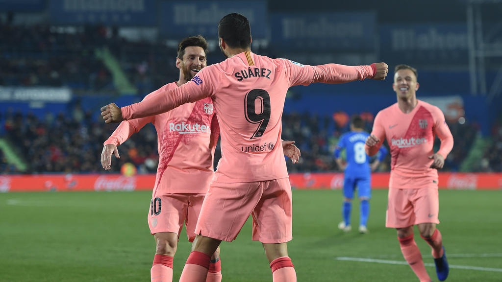 Messi y Suárez marcaron en Gentfe y lideran la tabla de goleadores. (Foto: Getty)