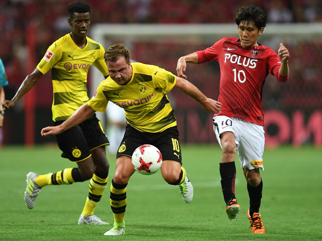 Mario Götze (M.) kann bei Borussia Dortmund wieder zu alter Stärker finden